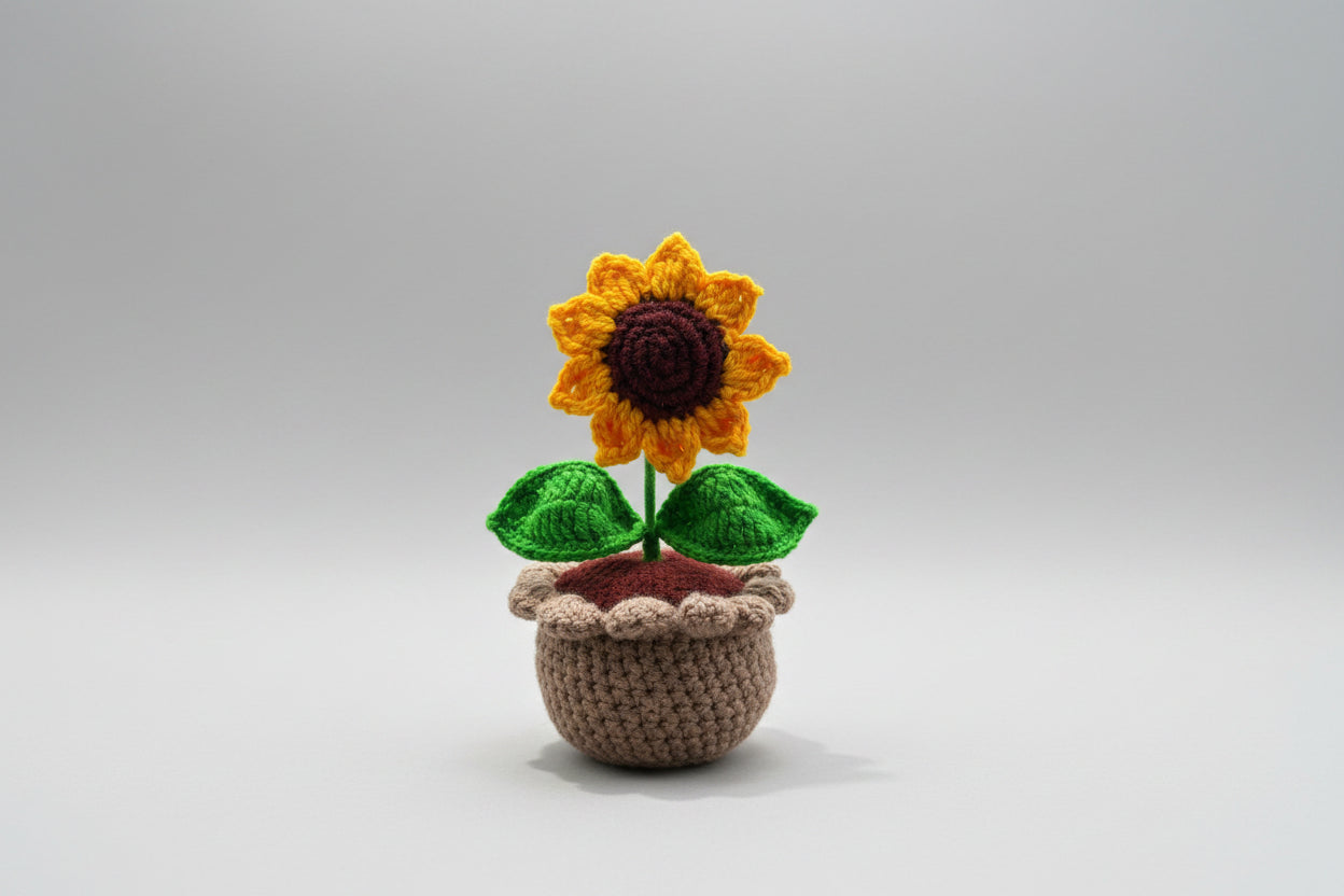 Handmade crochet sunflower in a crocheted pot — mini desk plant decor by The Crochet Nest