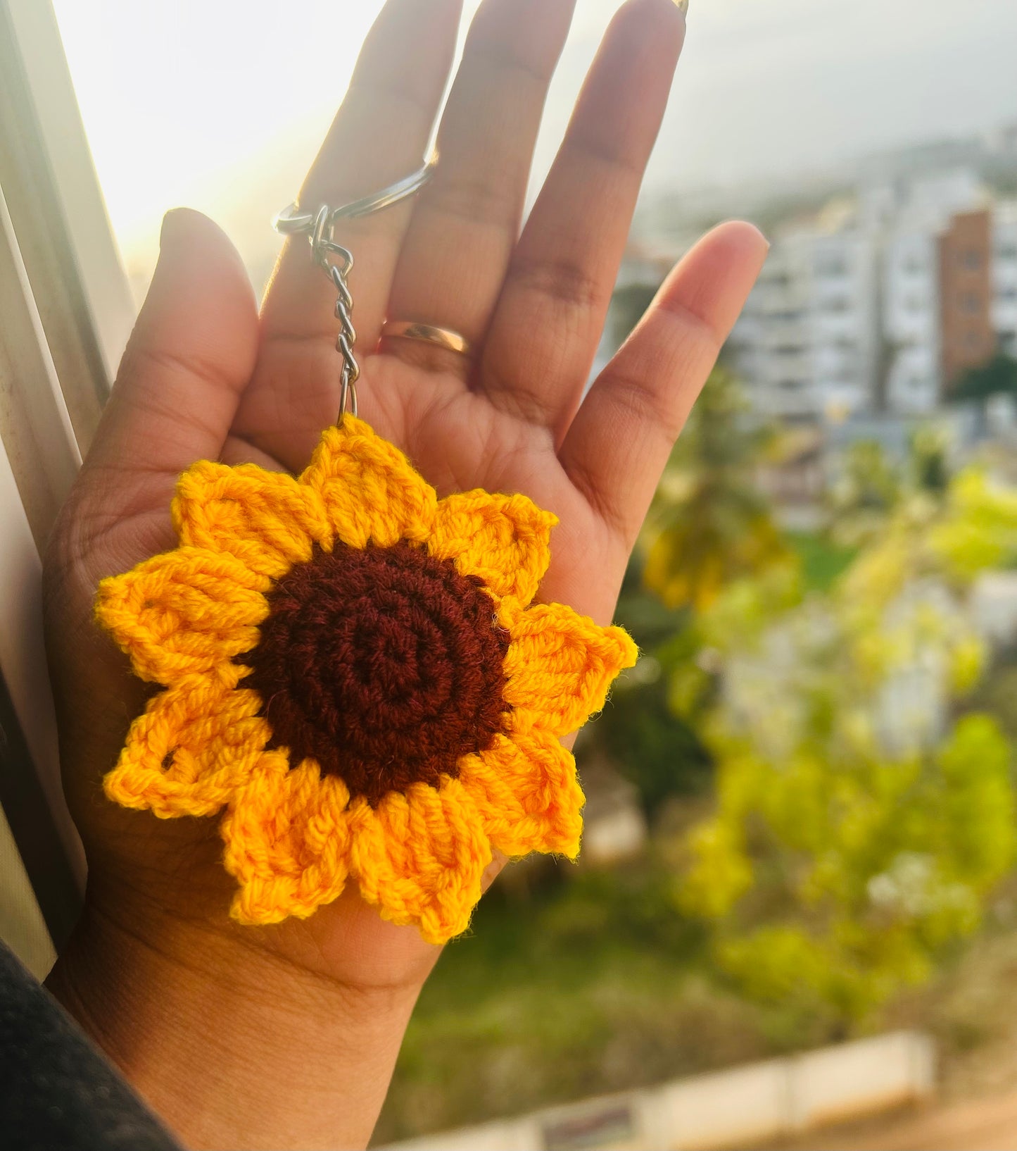 Handmade crochet sunflower keychain with metal keyring — cute flower bag charm by The Crochet Nest
